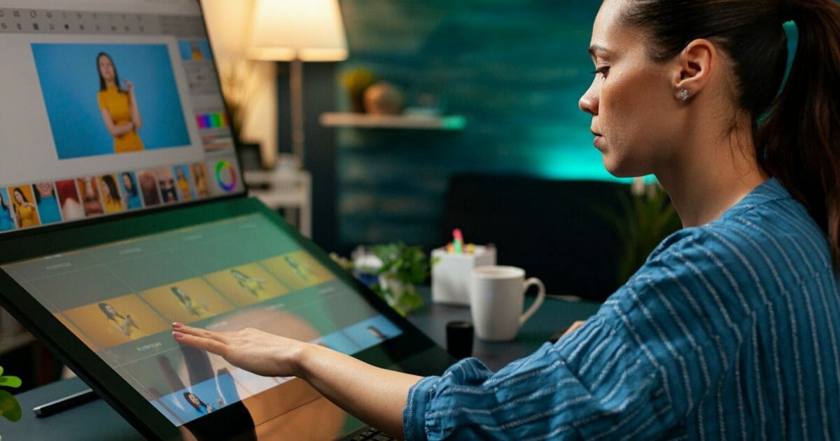 Professional editor doing retouching work on image