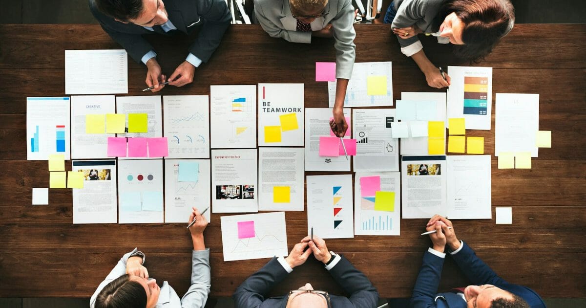 Business People Analyzing Statistics Financial Concept