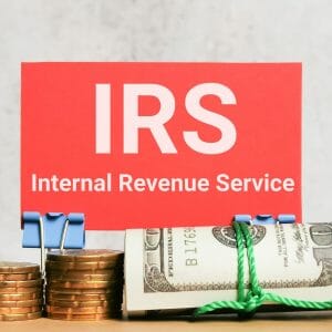 Phrase IRS INTERNAL REVENUE SERVICE written on red card