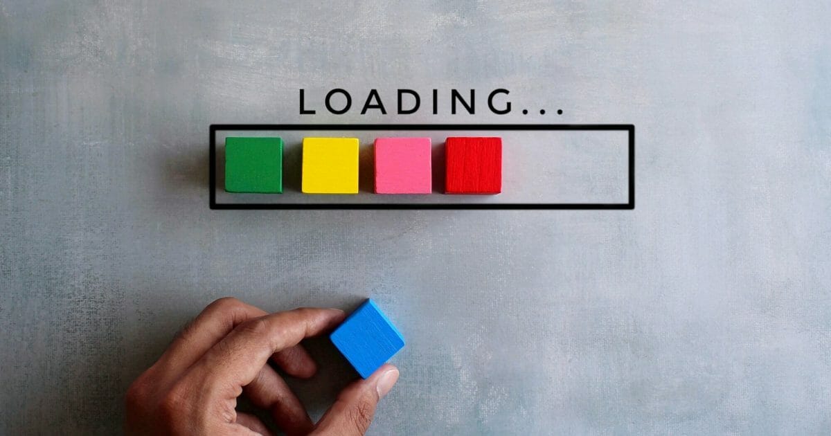 Top view image of loading bar with colorful wooden blocks on concrete floor.