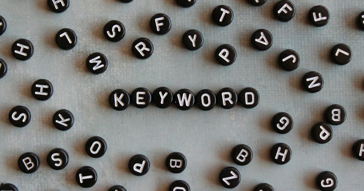 Alphabet beads with text KEYWORD