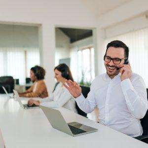 Positive sales agent at work, portrait.