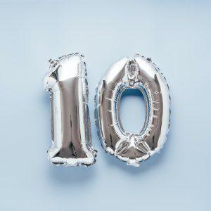 Silber balloon number 10 on light blue background