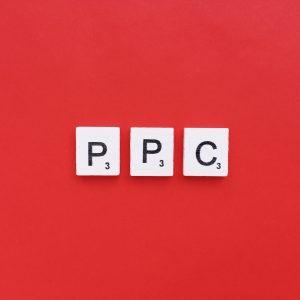 PPC scrabble letters word on a red background